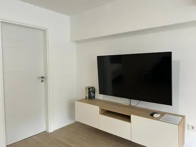 Una televisión o centro de entretenimiento en Las Tabaibas beach house