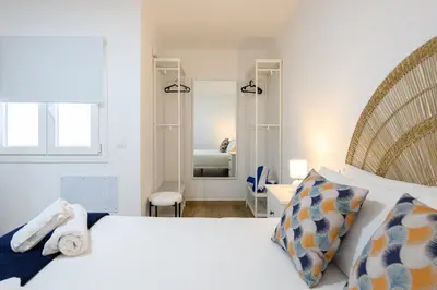 Cama o camas de una habitación en Gloria Beach Apartment