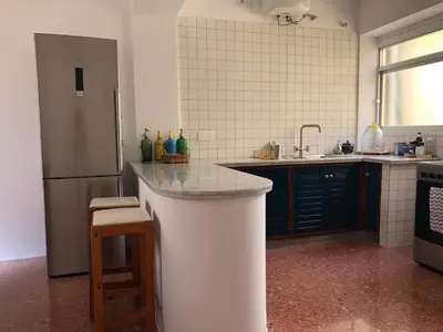 Una cocina o zona de cocina en Rooftop City Center LPA