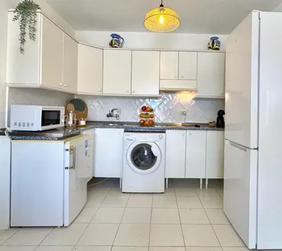 Una cocina o zona de cocina en Monseñor Ocean Panorama