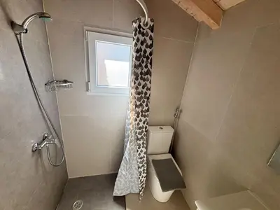Un baño de Vivienda Vacacional Carla 2