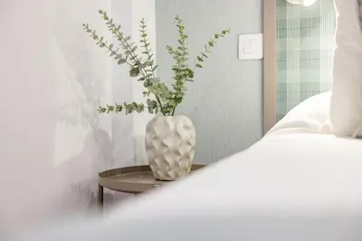 Cama o camas de una habitación en Alcaravaneras Beach Loft
