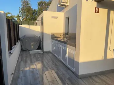Un balcón o terraza de Bungalow Maspalomas, Jacuzzi