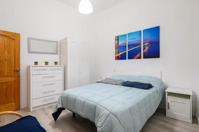 Cama o camas de una habitación en Casa JOY
