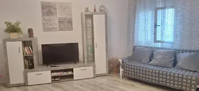 Una televisión o centro de entretenimiento en Casa JOY