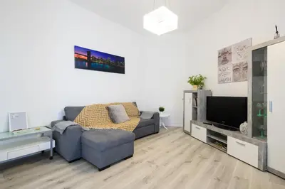 Una televisión o centro de entretenimiento en Casa JOY