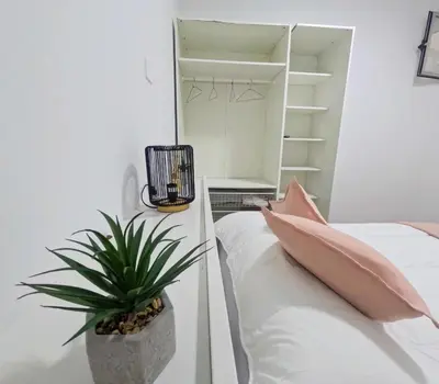 Cama o camas de una habitación en Alma Home
