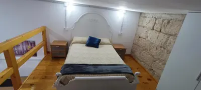Cama o camas de una habitación en La posada