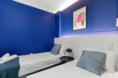 Cama o camas de una habitación en Large Attic Las Canteras Rooms - Only adults
