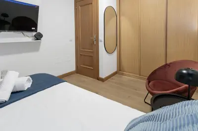 Cama o camas de una habitación en Large Attic Las Canteras Rooms - Only adults