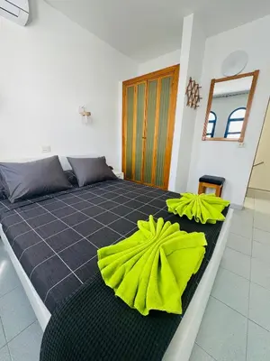 Cama o camas de una habitación en Bungalow Gilly