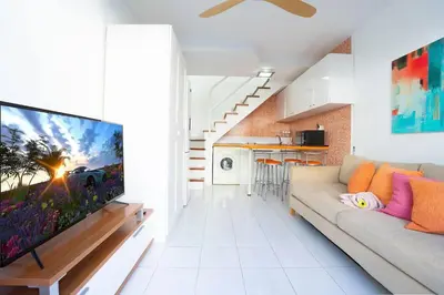 Una televisión o centro de entretenimiento en Dunaflor Verde 1213