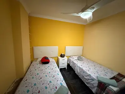 Cama o camas de una habitación en Apartment right on the beach