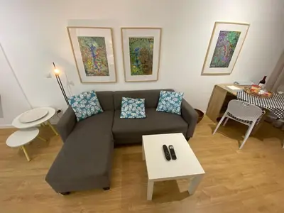 Zona de estar de Beachfront Suite Las Canteras