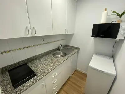 Una cocina o zona de cocina en Beachfront Suite Las Canteras