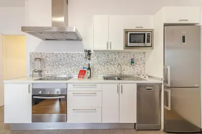 Una cocina o zona de cocina en Seafront Terrace Apartment Las Canteras