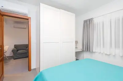 Cama o camas de una habitación en GuestReady - Tenesor 306