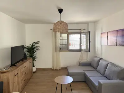 Una televisión o centro de entretenimiento en El Puertito Beach Retreat