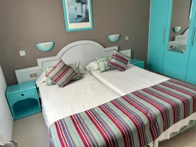Cama o camas de una habitación en SOL VELEROS Puerto Rico Apartement