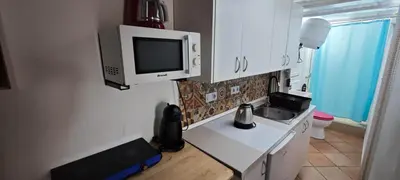 Una cocina o zona de cocina en Apartamentos en Castillo del Romeral