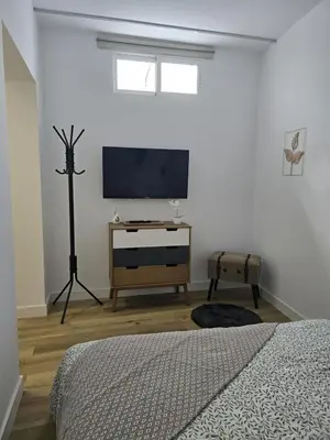 Una televisión o centro de entretenimiento en Apartamento Teror Encantado