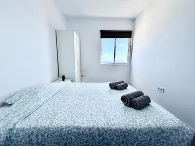 Cama o camas de una habitación en GD House cielo & mar