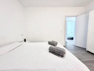 Cama o camas de una habitación en GD House cielo & mar