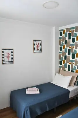 Cama o camas de una habitación en A los pies de Las Canteras - Atlantic Coral Bay