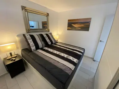 Cama o camas de una habitación en Los Volcanes Luxus Apartment