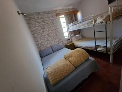 Cama o camas de una habitación en Hotel Rural Juncalillo