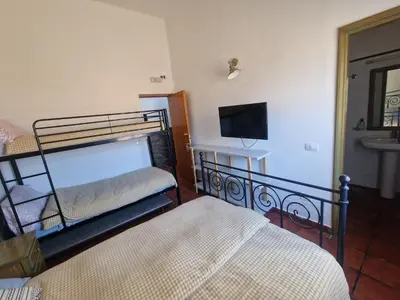 Cama o camas de una habitación en Hotel Rural Juncalillo