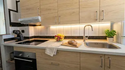 Una cocina o zona de cocina en Apartamento en Vecindario con WiFi rápido