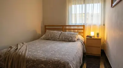 Cama o camas de una habitación en Apartamento en Vecindario con WiFi rápido