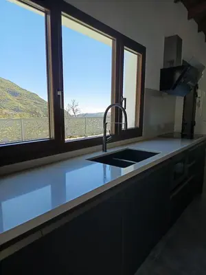 Una cocina o zona de cocina en Natura Luxury