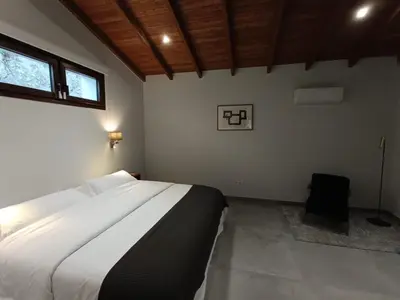Cama o camas de una habitación en Natura Luxury