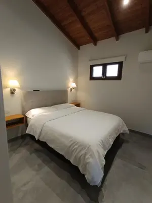 Cama o camas de una habitación en Natura Luxury