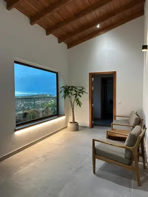 Una televisión o centro de entretenimiento en Natura Luxury