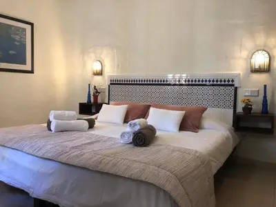 Cama o camas de una habitación en Altamar Beachfront