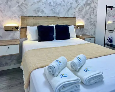 Cama o camas de una habitación en Apartamento Bahía con AIRE ACONDICIONADO