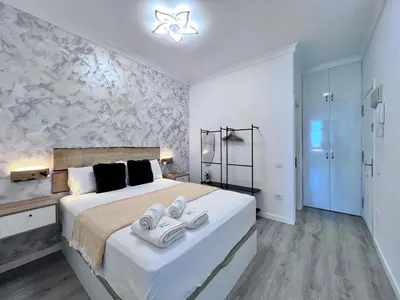 Cama o camas de una habitación en Apartamento Bahía con AIRE ACONDICIONADO