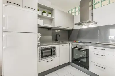 Una cocina o zona de cocina en Beachside Comfort Las Canteras