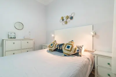 Cama o camas de una habitación en Home2Book Bright&Comfy Apt Near Las Palmas Center