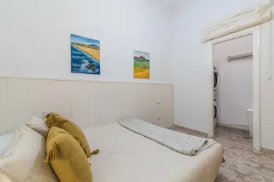 Cama o camas de una habitación en Home2Book Bright&Comfy Apt Near Las Palmas Center