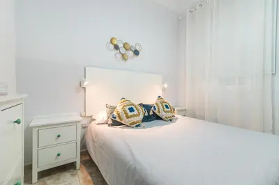 Cama o camas de una habitación en Home2Book Bright&Comfy Apt Near Las Palmas Center
