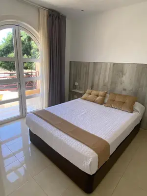 Cama o camas de una habitación en Weisshorn Bungalow A