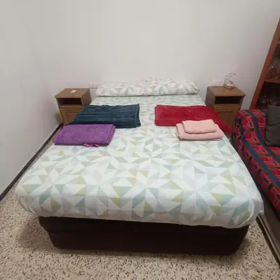 Cama o camas de una habitación en Double room in La Isleta, 100 meters from Las Canteras beach