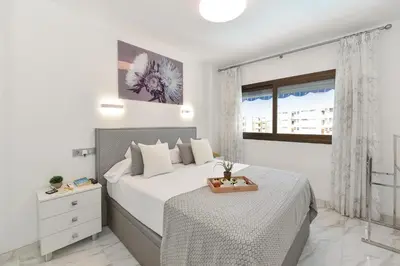 Cama o camas de una habitación en Iguazu 304 by VillaGranCanaria