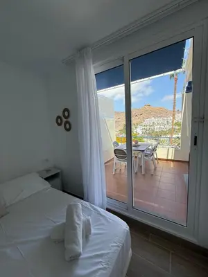 Cama o camas de una habitación en Lovisi Suite Playa del Cura - OCEAN & POOL VIEW