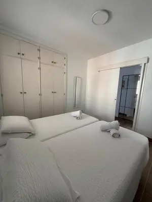 Cama o camas de una habitación en Lovisi Suite Playa del Cura - OCEAN & POOL VIEW