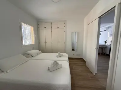 Cama o camas de una habitación en Lovisi Suite Playa del Cura - OCEAN & POOL VIEW